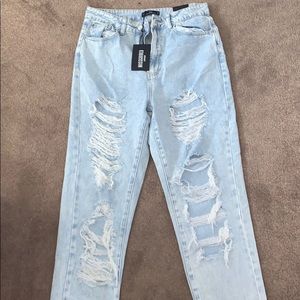 light blue ripped jeans